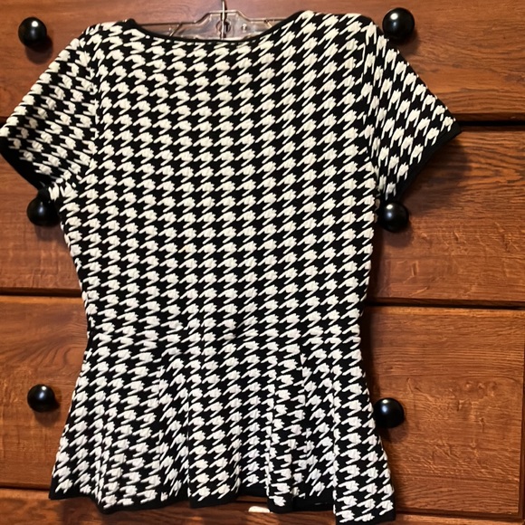 Adorable peplum top, classic black and white. Great for spring! - Picture 2 of 5